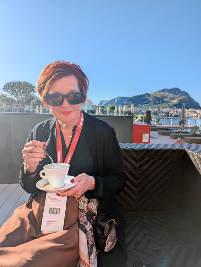 Mary Ann enjoying coffee